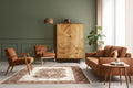 Wooden cabinet with geometric pattern in a room with green walls, brown chairs, and a plant.